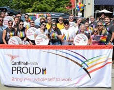 Cardinal Health employees attend a Pride parade. 