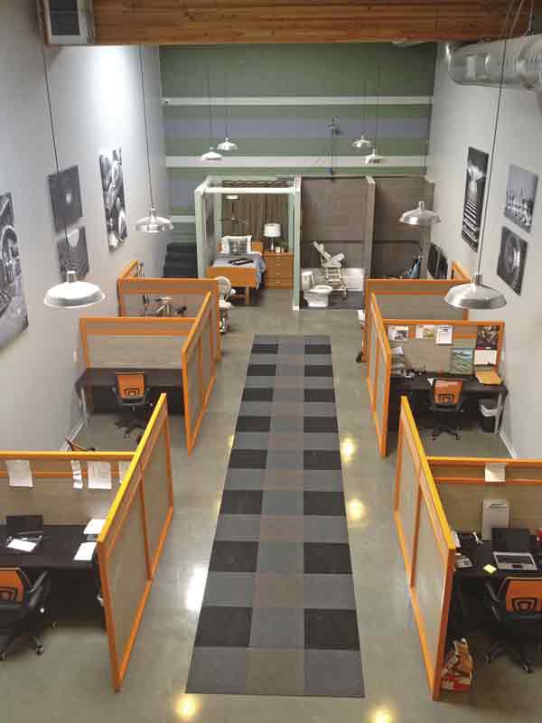 A display showroom is located near the staff's working space, making training as well as customer service more convenient.