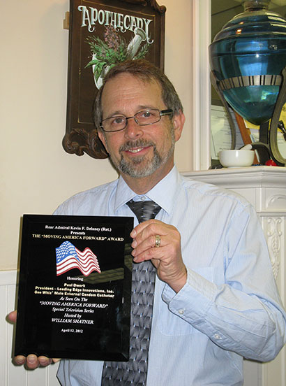 Paul Dwork with his award for “Moving America Forward.”