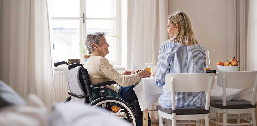 senior woman with caregiver