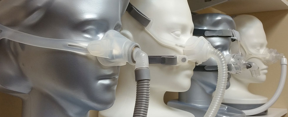 manaquin heads wearing CPAP masks