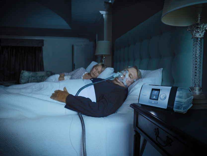 Man sleeping with CPAP