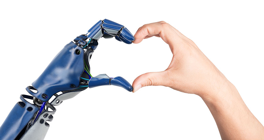 robot and human hand making a heart