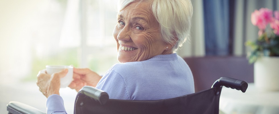 older white woman in a wheelchair