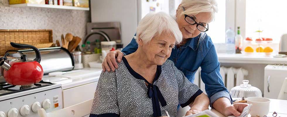 caregiver with elderly woman