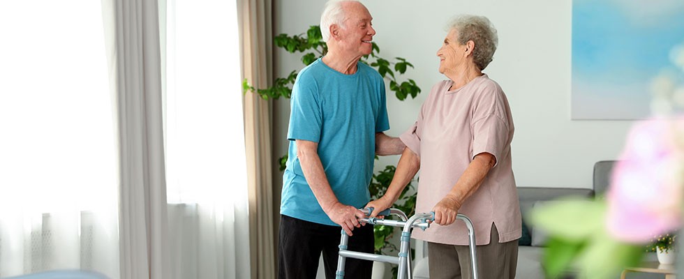 senior white couple looking at each other with love