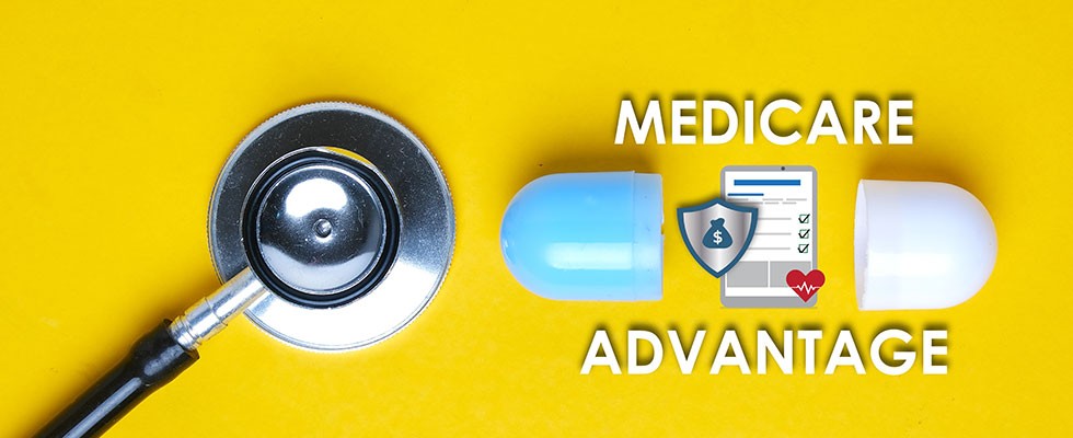 stethoscope on yellow background with broken pill showing Medicare Advantage
