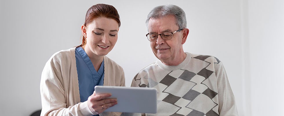 caregiver working with senior man