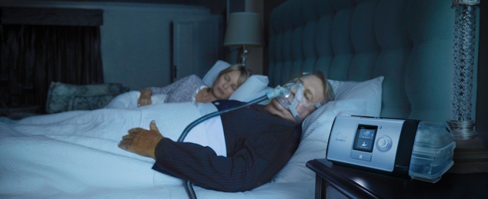 Man sleeping with CPAP