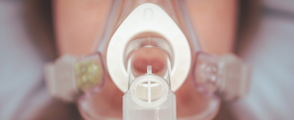 A CPAP mask on a woman's face