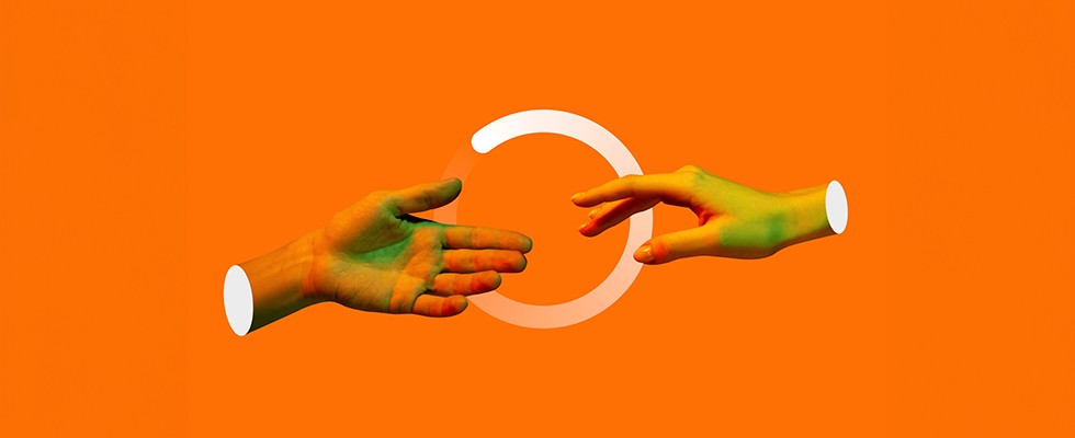 An orange background with two hands reaching out over a loading screen circle