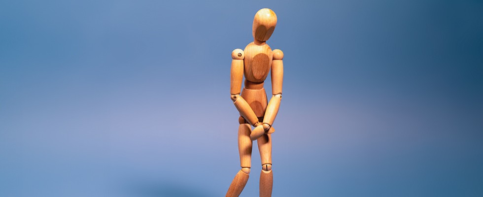 A person made from wooden dowels 