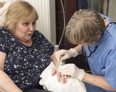 woman receiving home infusion