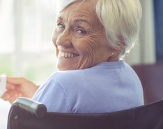 older white woman in a wheelchair