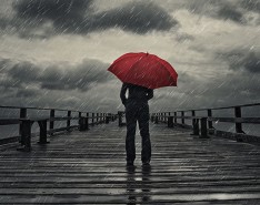 illustration of person standing in the rain