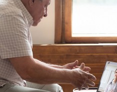 older man on a telehealth appointment