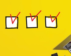 A yellow background with three checkmarks