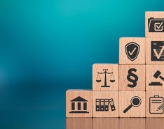 wooden blocks in a staircase with different legal symbols on them