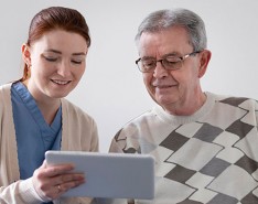 caregiver working with senior man