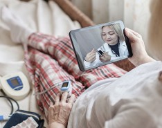 woman checking vital signs during telehealth appointment