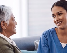 Nurse or caregiver with patient at home