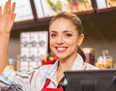 restaurant worker raising hand
