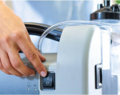 Hands handling home medical equipment