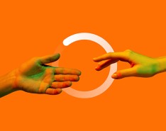 An orange background with two hands reaching out over a loading screen circle