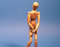 A person made from wooden dowels 