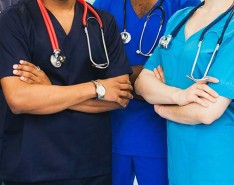 medical professionals standing in line