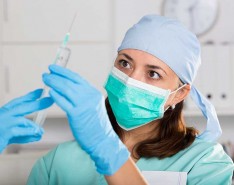 nurse preparing vaccine