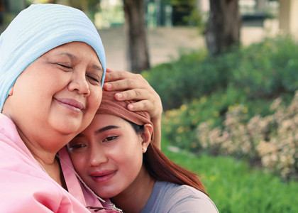 Two women embracing.