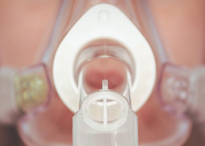 A CPAP mask on a woman's face