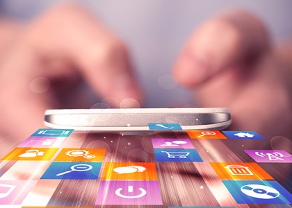 Hands typing on a smartphone