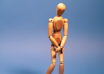 A person made from wooden dowels 