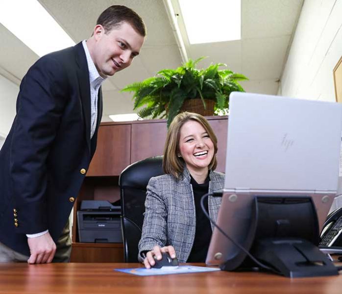 Justin and Meredith at computer