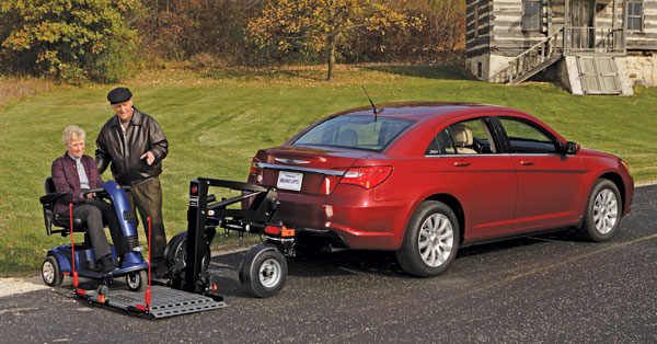 The Bruno Chariot lifts and stores your unoccupied scooter or power chair outside small, mid-sized or large cars at the touch of a button.